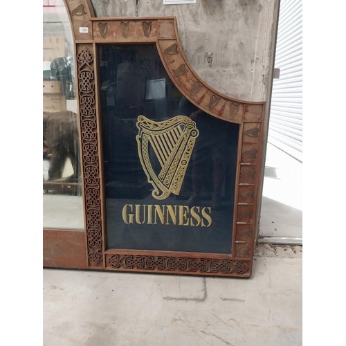 1280 - 20th C. Guinness mahogany bar back originally from The O'Conor Don pub London the centre mirror flan... 