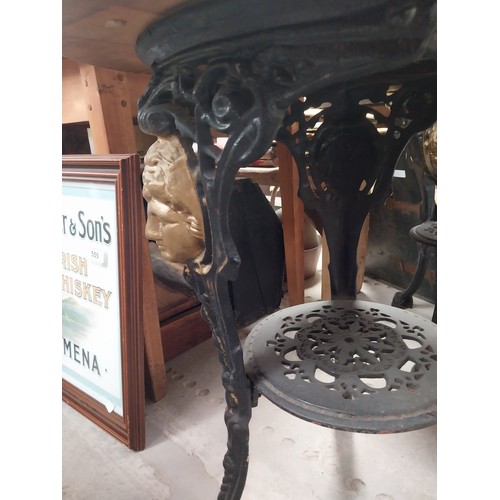 1275A - Pair of ornamental cast iron table bases. {111 cm H x 42 cm Diam.}