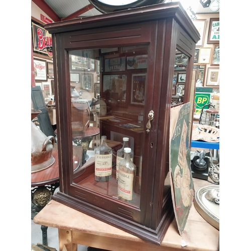 1270 - Early 1900's mahogany counter display cabinet with single glazed door {77 cm H x 53 cm W x 40 cm D}.