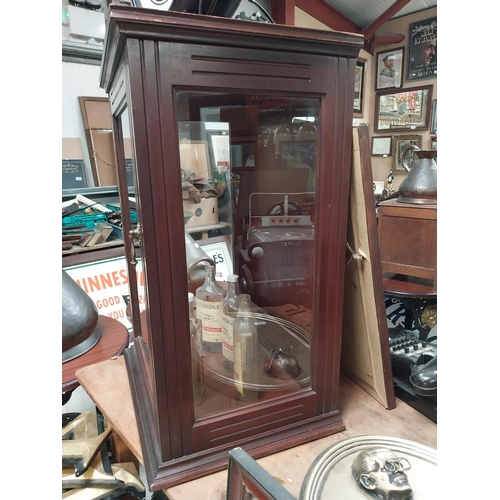 1270 - Early 1900's mahogany counter display cabinet with single glazed door {77 cm H x 53 cm W x 40 cm D}.