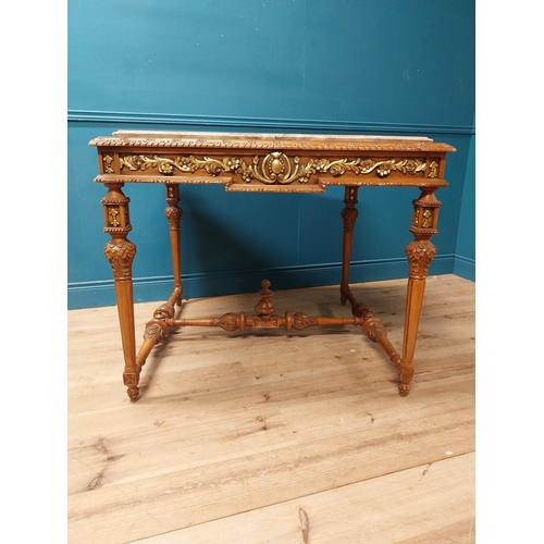 235 - Walnut and partial gilt centre table with marble top raised on carved turned legs {87 cm H x 104 cm ... 