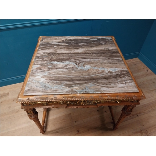 235 - Walnut and partial gilt centre table with marble top raised on carved turned legs {87 cm H x 104 cm ... 