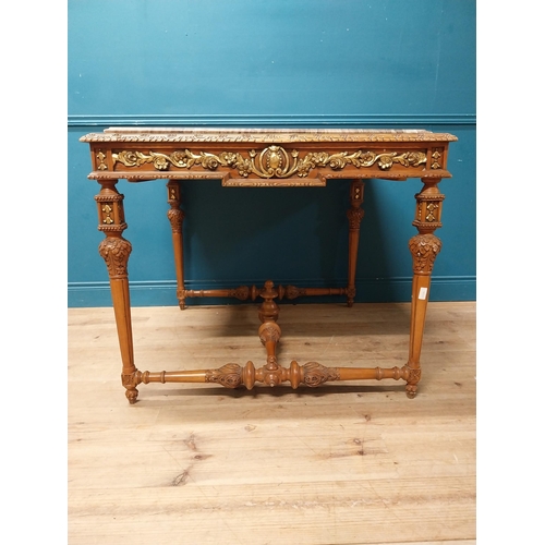 235 - Walnut and partial gilt centre table with marble top raised on carved turned legs {87 cm H x 104 cm ... 