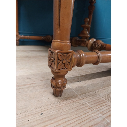 235 - Walnut and partial gilt centre table with marble top raised on carved turned legs {87 cm H x 104 cm ... 