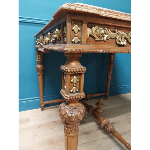 235 - Walnut and partial gilt centre table with marble top raised on carved turned legs {87 cm H x 104 cm ... 