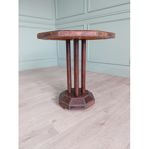 1173 - Rare early 20th C. leather brass studded table raised on oak columns and leather platform base {72 c... 