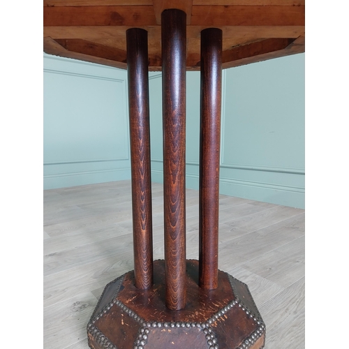 1173 - Rare early 20th C. leather brass studded table raised on oak columns and leather platform base {72 c... 