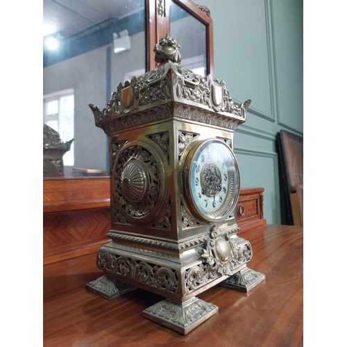 808 - Decorative brass mantle clock in the Victorian style {39 cm H x 19 cm W x 19 cm D}.