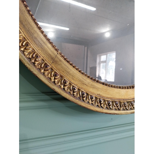 828 - Good quality French giltwood oval wall mirror {121 cm H x 136 cm W}.