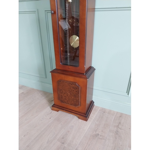 669 - Walnut Grandmother clock with brass dial {212 cm H x 45 cm W x 29 cm D}.