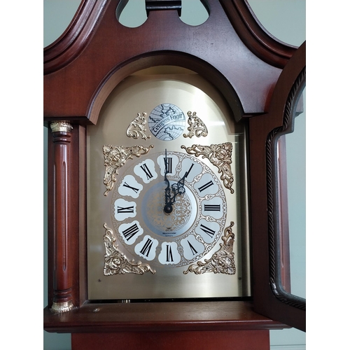 669 - Walnut Grandmother clock with brass dial {212 cm H x 45 cm W x 29 cm D}.