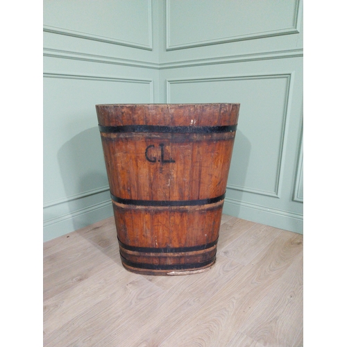 1092 - Early 20th C. metal bound pine log bucket {89 cm H x 71 cm W x 62 cm D}.