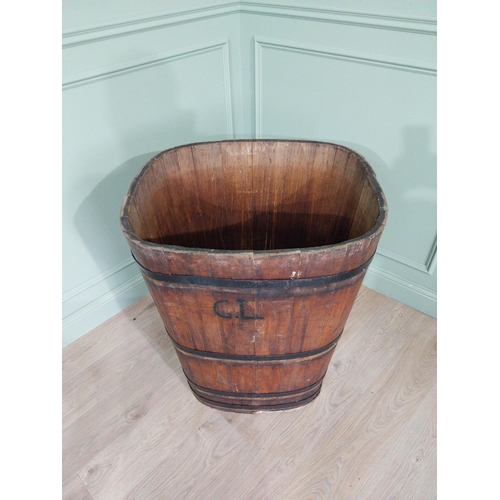 1092 - Early 20th C. metal bound pine log bucket {89 cm H x 71 cm W x 62 cm D}.