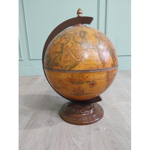 811 - Vintage drinks cabinet in the form of a World Globe {57 cm H x 42 cm Dia.}.