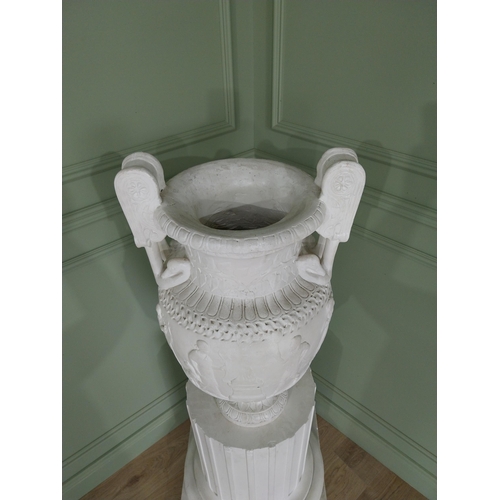 1146 - 20th C. Grand Tour plaster Grecian Urn on Pedestal. {147 cm H x 56 cm W x 56 cm D}.