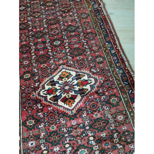 427 - Good quality decorative Persian carpet runner {297 cm L x 105 cm W}.