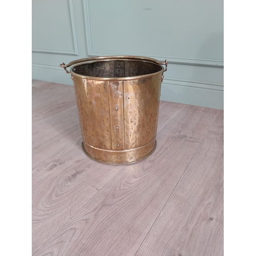 1007 - Edwardian brass log bucket with handle {47 cm H x 38 cm Dia.}