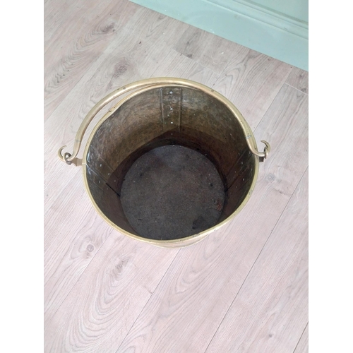 1007 - Edwardian brass log bucket with handle {47 cm H x 38 cm Dia.}