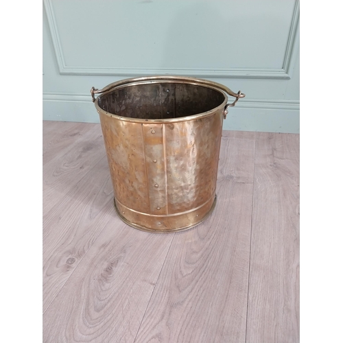 1007 - Edwardian brass log bucket with handle {47 cm H x 38 cm Dia.}