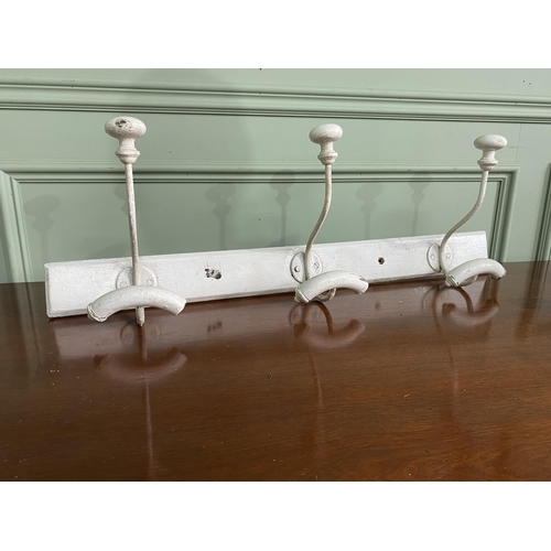 1012 - Early 20th C. pine and wrought iron wall mounted hat and coat rack {28 cm H x 80 cm W x 17 cm D}.