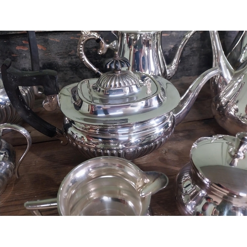 1018 - Two early 20th C. silver plate coffee sets - twelve pieces in total.