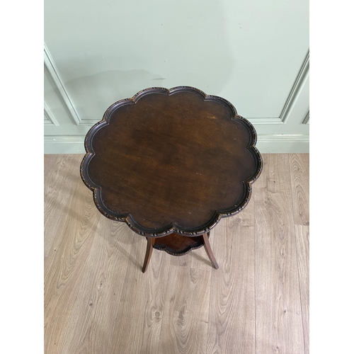 1025 - 1950s mahogany dish top lamp table raised on four square tapered legs {70 cm H x 46 cm Dia.}.