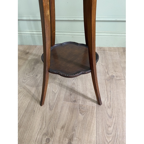 1025 - 1950s mahogany dish top lamp table raised on four square tapered legs {70 cm H x 46 cm Dia.}.