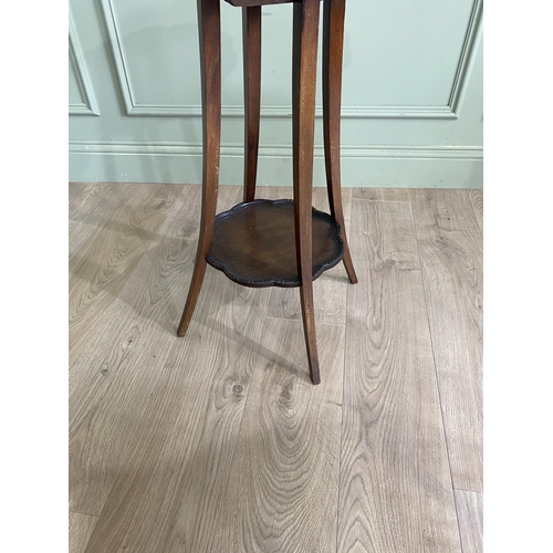 1025 - 1950s mahogany dish top lamp table raised on four square tapered legs {70 cm H x 46 cm Dia.}.