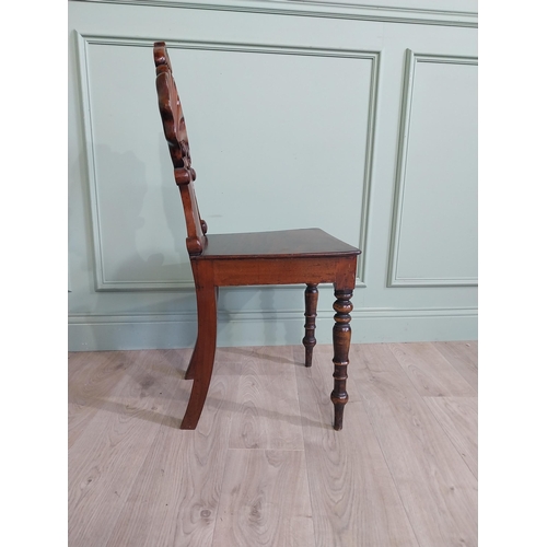 1035 - Pair of William IV mahogany hall chairs with shell back raised on turned legs {96 cm H x 43 cm W x 4... 