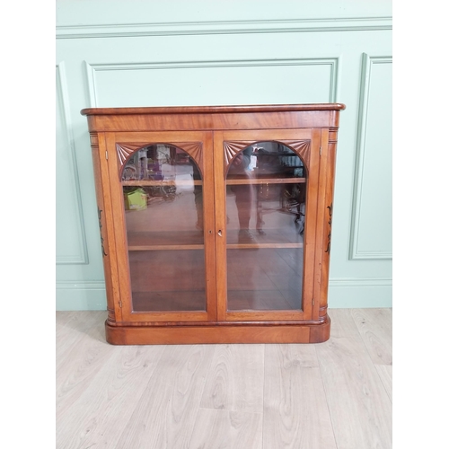 1040 - Good quality 19th C. flamed mahogany side cabinet with ebony inlay and two glazed doors {88 cm H x 9... 