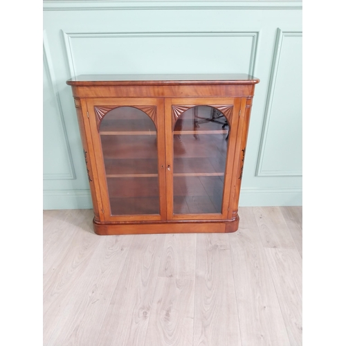 1040 - Good quality 19th C. flamed mahogany side cabinet with ebony inlay and two glazed doors {88 cm H x 9... 