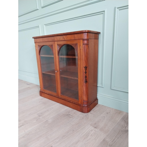 1040 - Good quality 19th C. flamed mahogany side cabinet with ebony inlay and two glazed doors {88 cm H x 9... 