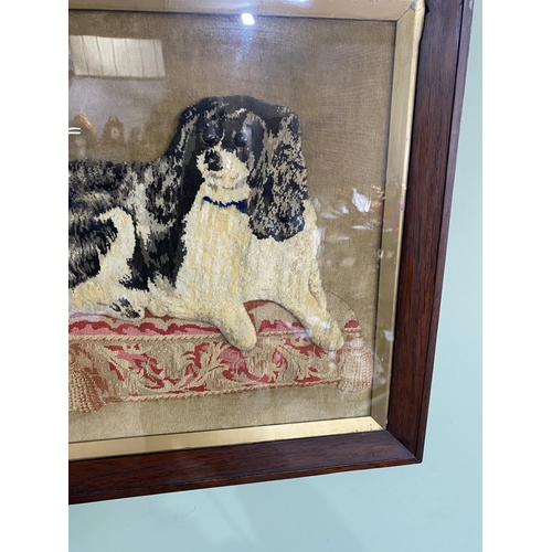 1042 - 19th C. Cocker Spaniel embroidery mounted in rosewood frame {56 cm H x 58 cm W}.