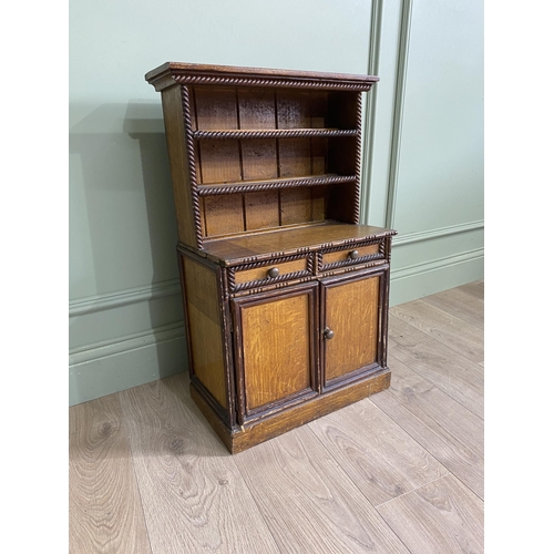 1061 - 19th C. scumbled pine miniature dressers with two single drawers above two blind doors {76 cm H x 45... 