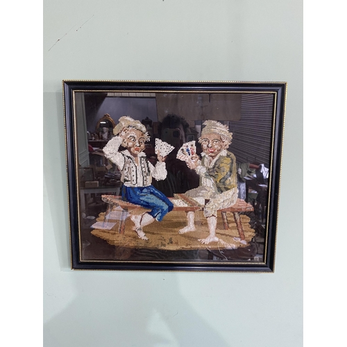 1067 - 19th C. Card Players embroidery mounted in gilt and ebonised frame {47 cm H x 52 cm W}.