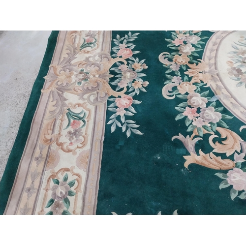 1069 - Large decorative green carpet square {487 cm L x 366 cm W}.