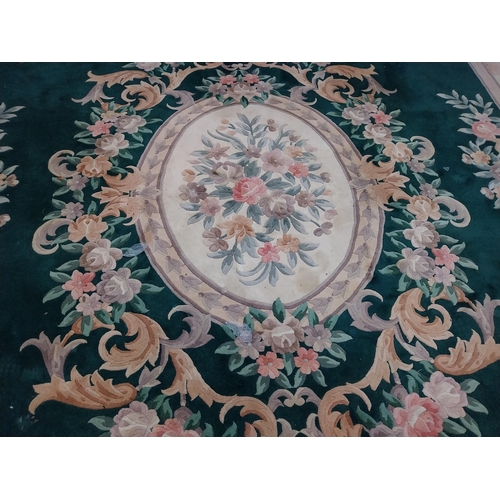 1069 - Large decorative green carpet square {487 cm L x 366 cm W}.