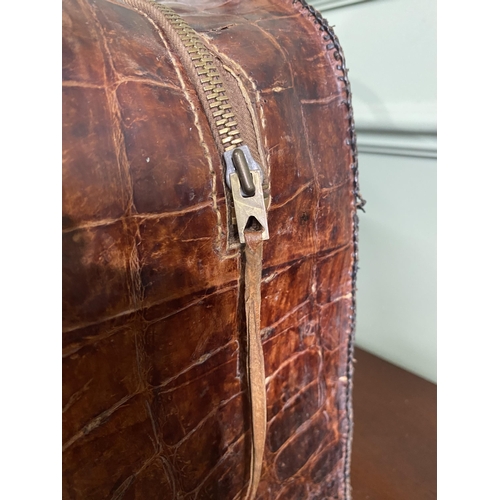 1070 - Early 20th C. crocodile leather hand bag {27 cm H x 40 cm W x 14 cm D}.