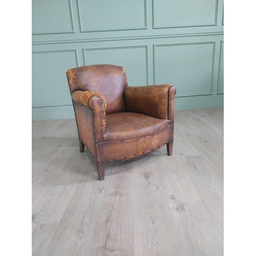 1073 - Early 20th C. French hand dyed leather upholstered club chair raised on square tapered legs {78 cm H... 