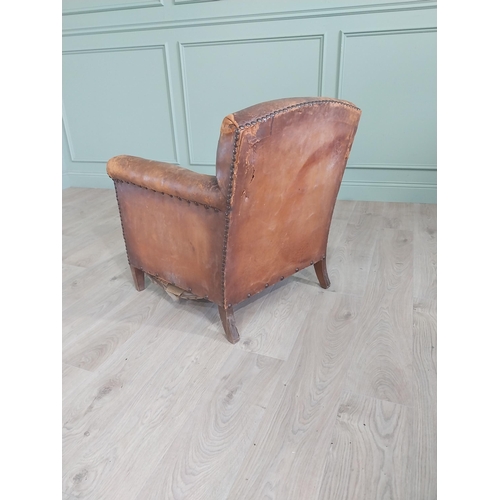 1073 - Early 20th C. French hand dyed leather upholstered club chair raised on square tapered legs {78 cm H... 