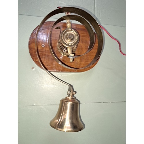 1076 - Butlers brass door bell mounted on wooden plaque. - NOT AVAILABLE TO VIEW IN PERSON