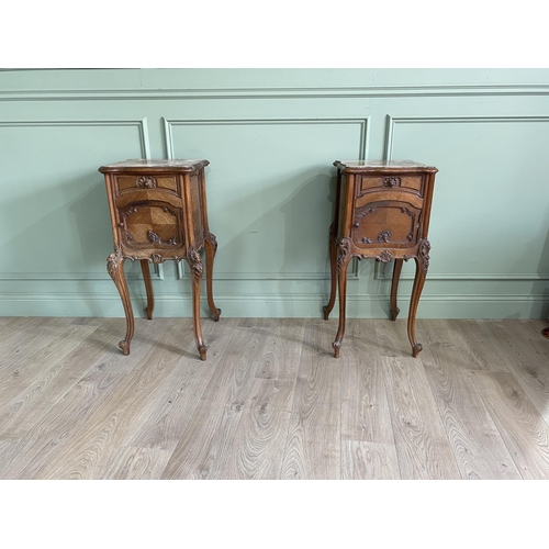 1078 - Pair of 19th C. French carved walnut bedside lockers with inset marble tops and one single drawer ov... 