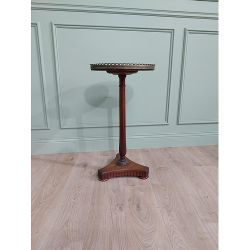 108 - 19th C. mahogany wine table with marble top and brass gallery raised on reeded column and platform b... 