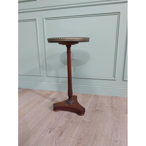 108 - 19th C. mahogany wine table with marble top and brass gallery raised on reeded column and platform b... 