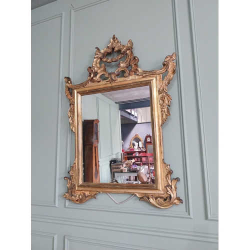 1080 - 19th C. decorative Italian giltwood wall mirror {146 cm H x 100 cm W}.