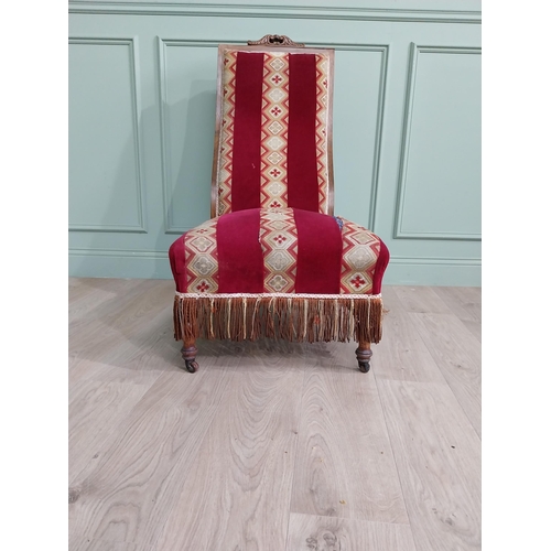 1085 - William IV rosewood and satinwood inlaid upholstered nursing chair raised on turned legs {106 cm H x... 