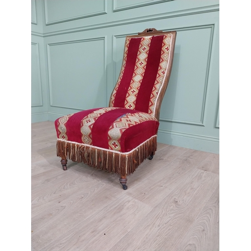 1085 - William IV rosewood and satinwood inlaid upholstered nursing chair raised on turned legs {106 cm H x... 