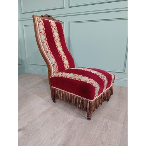 1085 - William IV rosewood and satinwood inlaid upholstered nursing chair raised on turned legs {106 cm H x... 