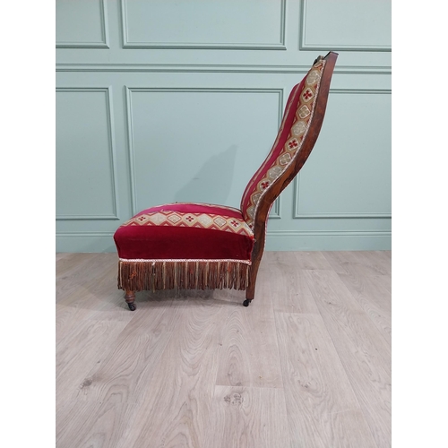 1085 - William IV rosewood and satinwood inlaid upholstered nursing chair raised on turned legs {106 cm H x... 