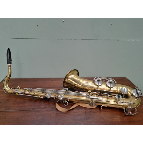 1088 - Saxophone in case  {H 85cm x W 15cm x D 25cm }. - NOT AVAILABLE TO VIEW IN PERSON